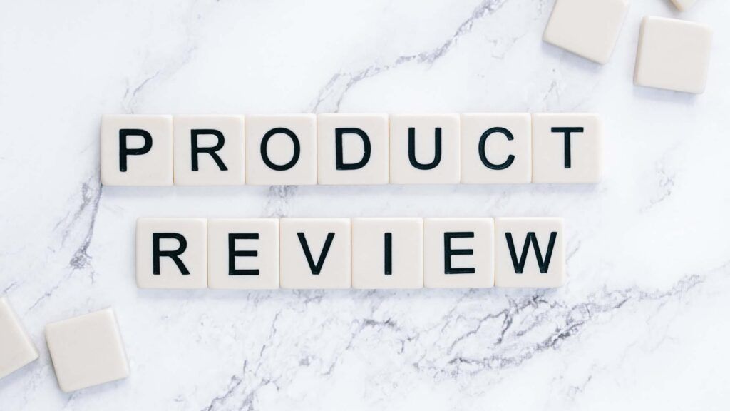 Product Review word spelled with scrabble pieces.